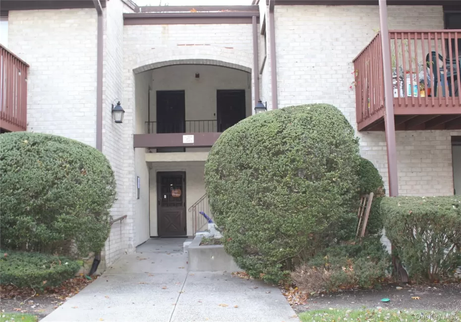 Entrance to property featuring brick siding Entrance to property featuring brick siding