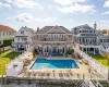 Back of property with a patio, a balcony, and a fenced backyard Back of property with a patio, a balcony, and a fenced backyard