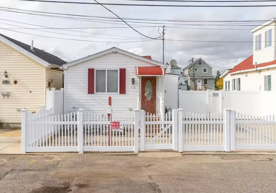 View of front of home featuring a gate and a fenced front yard View of front of home featuring a gate and a fenced front yard