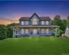 Welcome to 954 Ridgebury Road in New Hampton, NY, a beautiful 44+ acre retreat that feels private and tucked away, yet is just 10 minutes from everyday conveniences. This twilight view captures the home’s warm and inviting first impression, with glowing windows, a wide front porch, and a peaceful setting that immediately sets the tone for the property. Welcome to 954 Ridgebury Road in New Hampton, NY, a beautiful 44+ acre retreat that feels private and tucked away, yet is just 10 minutes from everyday conveniences. This twilight view captures the home’s warm and inviting first impression, with glowing windows, a wide front porch, and a peaceful setting that immediately sets the tone for the property.