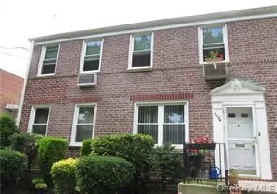 Colonial house with brick siding Colonial house with brick siding