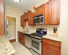 Renovated Eat-in-Kitchen has Granite Counters, Stainless Steel Appliances, Cherry Cabinets and a window for ventilation and natural light. Renovated Eat-in-Kitchen has Granite Counters, Stainless Steel Appliances, Cherry Cabinets and a window for ventilation and natural light.