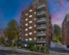 Property at dusk with a view of apartment building / complex Property at dusk with a view of apartment building / complex