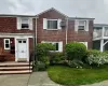Multi unit property with a wall mounted air conditioner and brick siding Multi unit property with a wall mounted air conditioner and brick siding