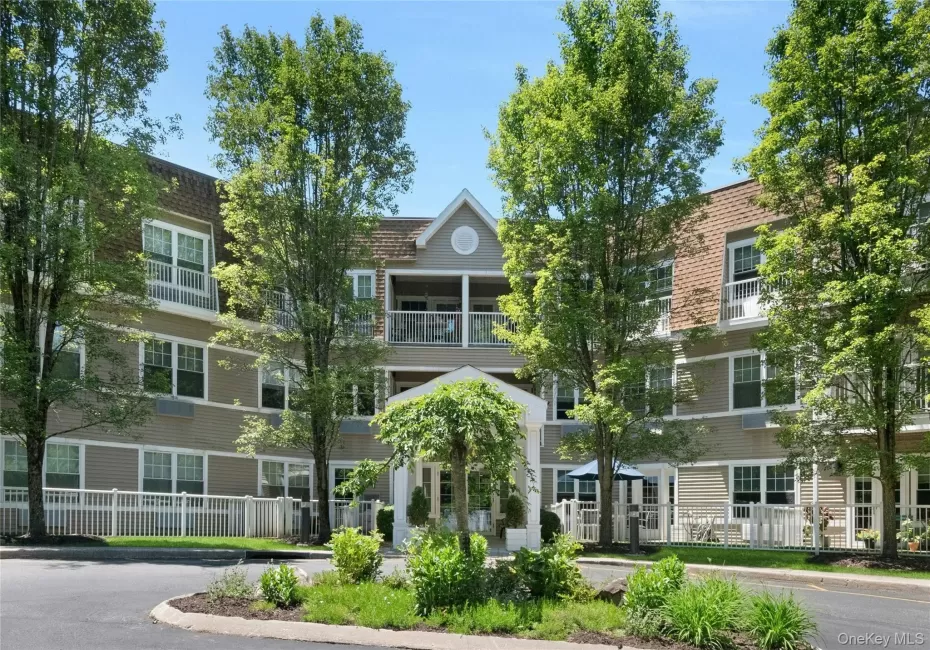 Front of garden style apartments in a courtyard setting Front of garden style apartments in a courtyard setting