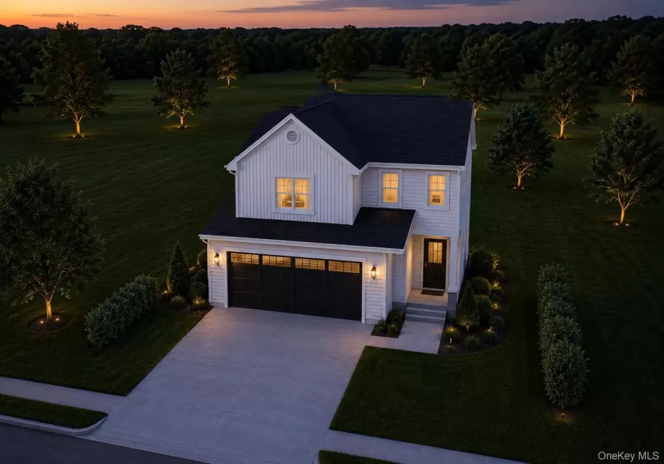 Two-story residence featuring white siding and a dark roof Two-story residence featuring white siding and a dark roof
