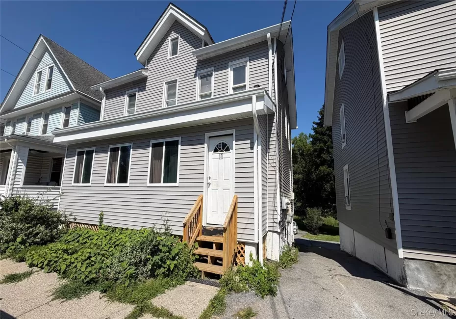 Welcome Home! Renovated exterior with new siding and front stairs. Welcome Home! Renovated exterior with new siding and front stairs.