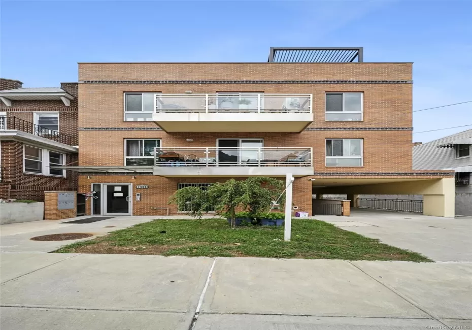 View of building exterior with driveway View of building exterior with driveway