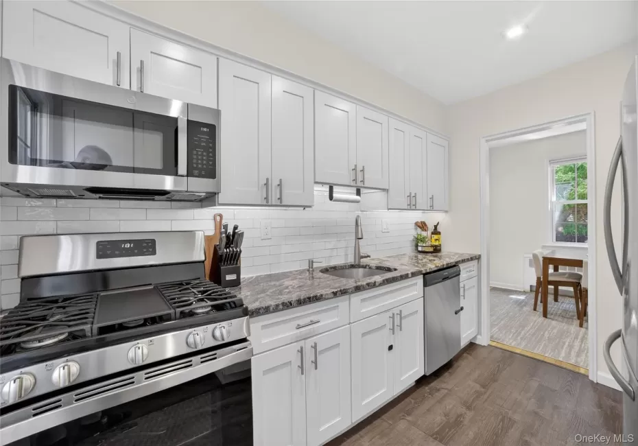 Kitchen Features: New SS Appliances, Under-cabinet Lighting, Marble Countertops, Under-mount Sink Kitchen Features: New SS Appliances, Under-cabinet Lighting, Marble Countertops, Under-mount Sink