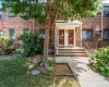 Property entrance featuring brick siding Property entrance featuring brick siding