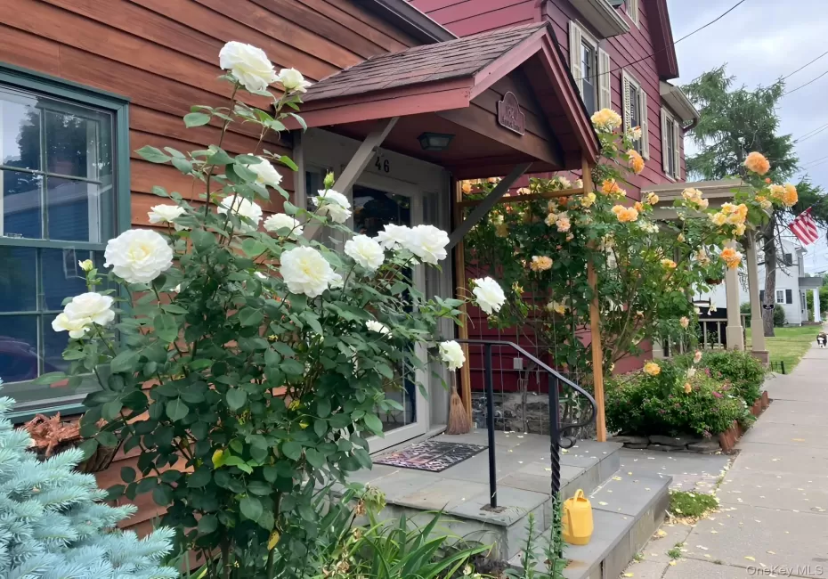 Mature plantings and rose bushes. Mature plantings and rose bushes.