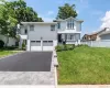 View of front of home with a garage and driveway View of front of home with a garage and driveway