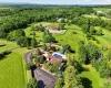 Set in a bucolic area of fine homes, the house has lovely views of the hills beyond the farm Set in a bucolic area of fine homes, the house has lovely views of the hills beyond the farm