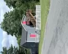 Gray siding exterior with contrasting bright pink doors Gray siding exterior with contrasting bright pink doors