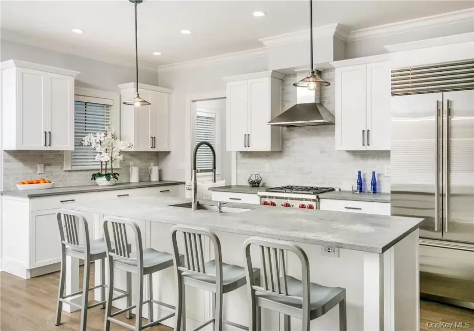 Chef-Friendly Kitchen with Island and Top-Tier Appliances Chef-Friendly Kitchen with Island and Top-Tier Appliances
