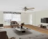 STAGED: Living room with wood finished floors, a ceiling fan, and radiator STAGED: Living room with wood finished floors, a ceiling fan, and radiator