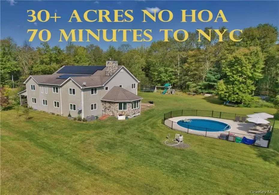 Drone / aerial view of a pool and a forest Drone / aerial view of a pool and a forest