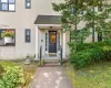 Interlaken Co-ops - a community of Garden Style apartments with brick exteriors. Covered entry and black front door to building #14 Manchester Interlaken Co-ops - a community of Garden Style apartments with brick exteriors. Covered entry and black front door to building #14 Manchester