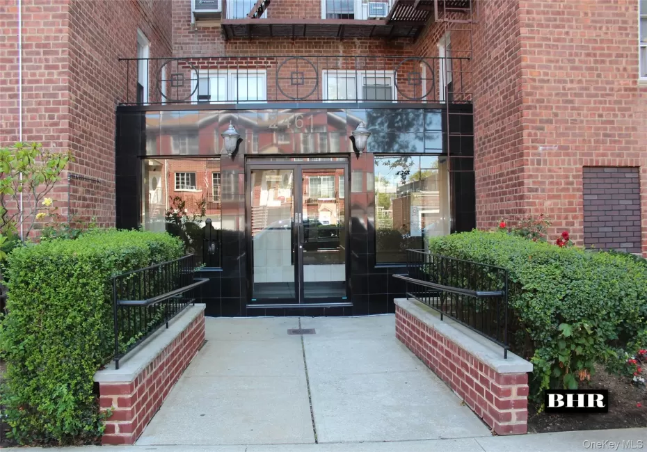 Property entrance with brick siding Property entrance with brick siding