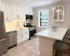 Beautifully renovated kitchen with 7 foot Quartz peninsula Beautifully renovated kitchen with 7 foot Quartz peninsula