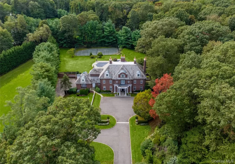 Privately set on two acres surrounded by mature Evergreens Privately set on two acres surrounded by mature Evergreens