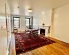 This lovely apartment has original hardwood floors throughout the living room and entry hallway. The space is beautifully lit by both the morning and afternoon sun. This lovely apartment has original hardwood floors throughout the living room and entry hallway. The space is beautifully lit by both the morning and afternoon sun.