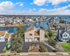 Aerial view of residential area featuring a nearby body of water Aerial view of residential area featuring a nearby body of water