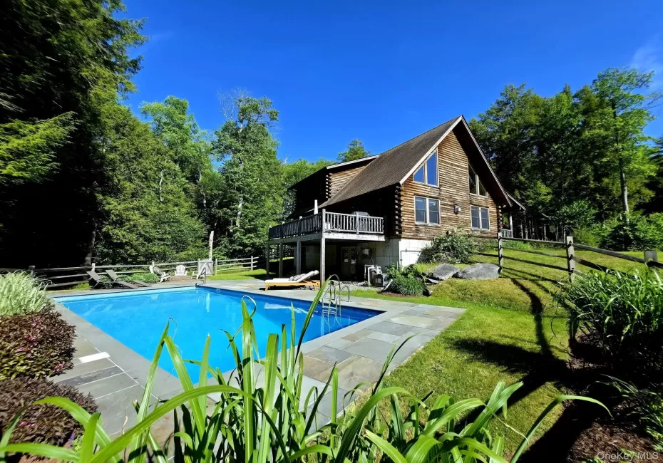 View of the back of the cabin & saltwater pool View of the back of the cabin & saltwater pool