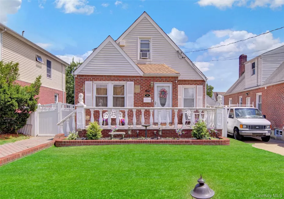 Brick and siding exterior with a pitched roof Brick and siding exterior with a pitched roof