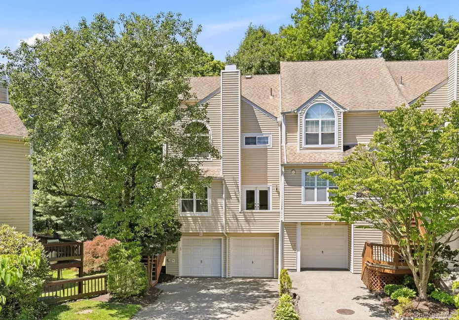 Welcome to The Hamlet and this end-unit townhouse Welcome to The Hamlet and this end-unit townhouse