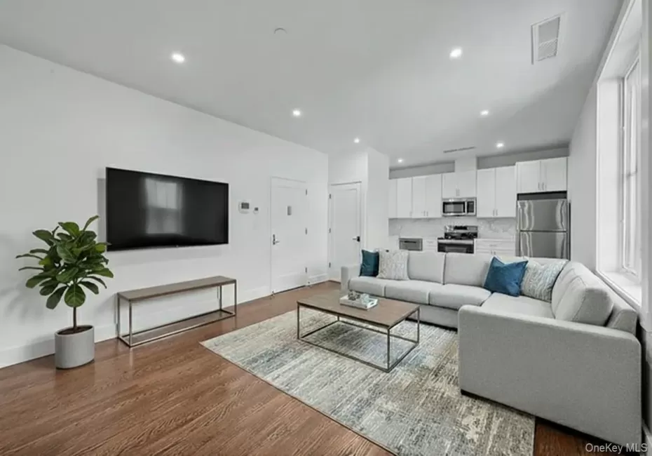 Living Room Looking towards Kitchen - Virtually Staged Living Room Looking towards Kitchen - Virtually Staged