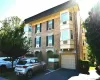 Brick exterior featuring multiple windows and shutters Brick exterior featuring multiple windows and shutters