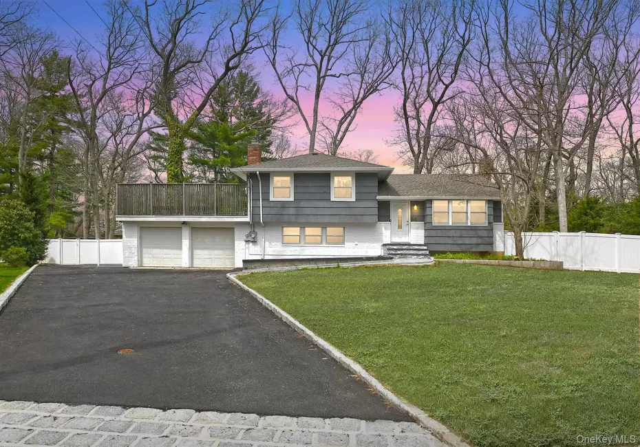 Expanded split level home featuring a 2+ car garage on a .5 acre lot on a quiet cul de sac Expanded split level home featuring a 2+ car garage on a .5 acre lot on a quiet cul de sac