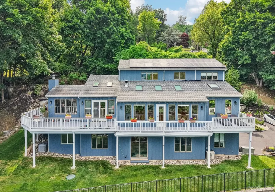 Contemporary home surrounded by tranquil forest views. Contemporary home surrounded by tranquil forest views.