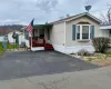 Welcome to 31 N Mountainview MHP - a wonderful afforable 2 bedroom manufactured home with a cute wooden deck, patio, and driveway parking area for 2 cars Welcome to 31 N Mountainview MHP - a wonderful afforable 2 bedroom manufactured home with a cute wooden deck, patio, and driveway parking area for 2 cars