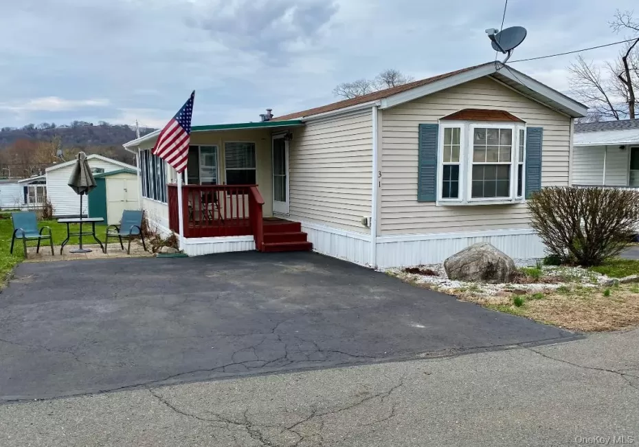 Welcome to 31 N Mountainview MHP - a wonderful afforable 2 bedroom manufactured home with a cute wooden deck, patio, and driveway parking area for 2 cars Welcome to 31 N Mountainview MHP - a wonderful afforable 2 bedroom manufactured home with a cute wooden deck, patio, and driveway parking area for 2 cars