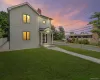 Modern stucco exterior with black-framed windows Modern stucco exterior with black-framed windows