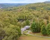 View from above of property featuring a forest View from above of property featuring a forest