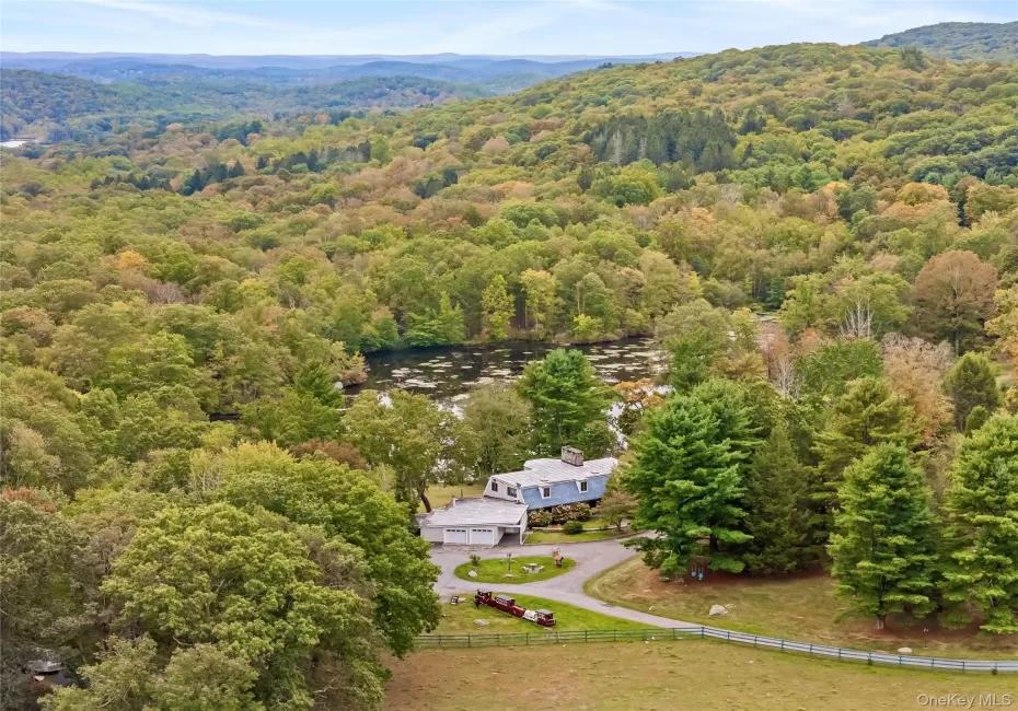 View from above of property featuring a forest View from above of property featuring a forest