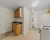 Eat in kitchn with view of bathroom and door to back fire escape. Eat in kitchn with view of bathroom and door to back fire escape.