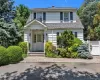 View of front of home featuring a shingled roof View of front of home featuring a shingled roof