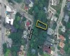 Aerial map of property and surrounding area with property parcel outlined Aerial map of property and surrounding area with property parcel outlined
