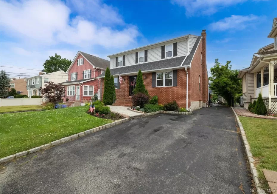 Front of House w/ 1 Parking Spot In Driveway Front of House w/ 1 Parking Spot In Driveway