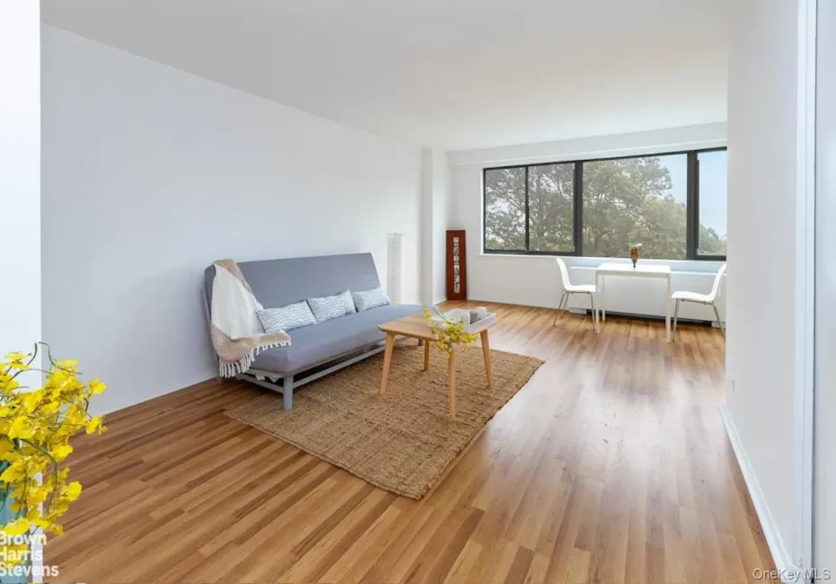Sitting room featuring light wood-type flooring Sitting room featuring light wood-type flooring