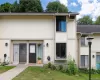 Light-toned vertical siding exterior with contrasting trim details Light-toned vertical siding exterior with contrasting trim details