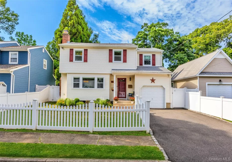 Lovelly updated 4 bedroom colonial with picket fenced front yard! Lovelly updated 4 bedroom colonial with picket fenced front yard!