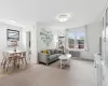 Bright living space featuring neutral carpet flooring and white painted walls Bright living space featuring neutral carpet flooring and white painted walls