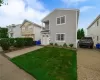 Two-story residence featuring new pavers and landscaping. Two-story residence featuring new pavers and landscaping.