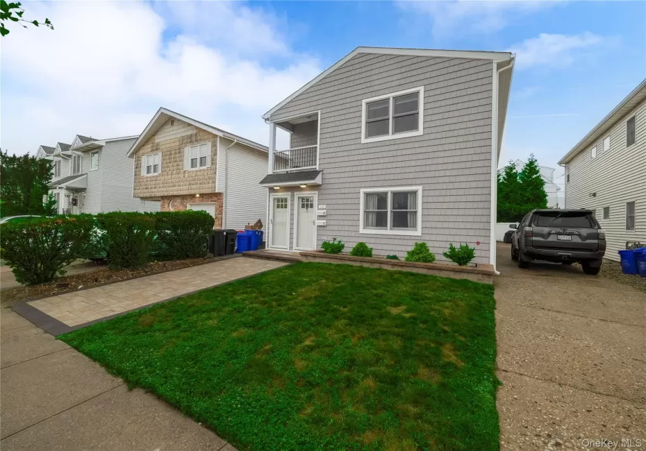 Two-story residence featuring new pavers and landscaping. Two-story residence featuring new pavers and landscaping.