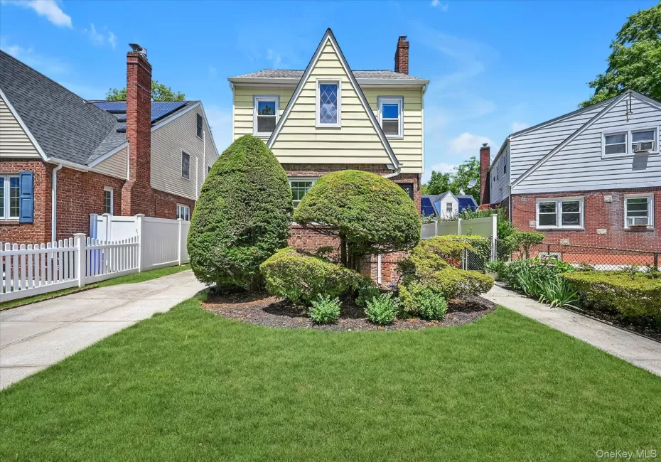 Colonial Tudor Brick & Frame Colonial Tudor Brick & Frame